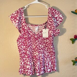 NWT Japna ladies' floral top featuring smocking, flutter sleeves, and a pink and